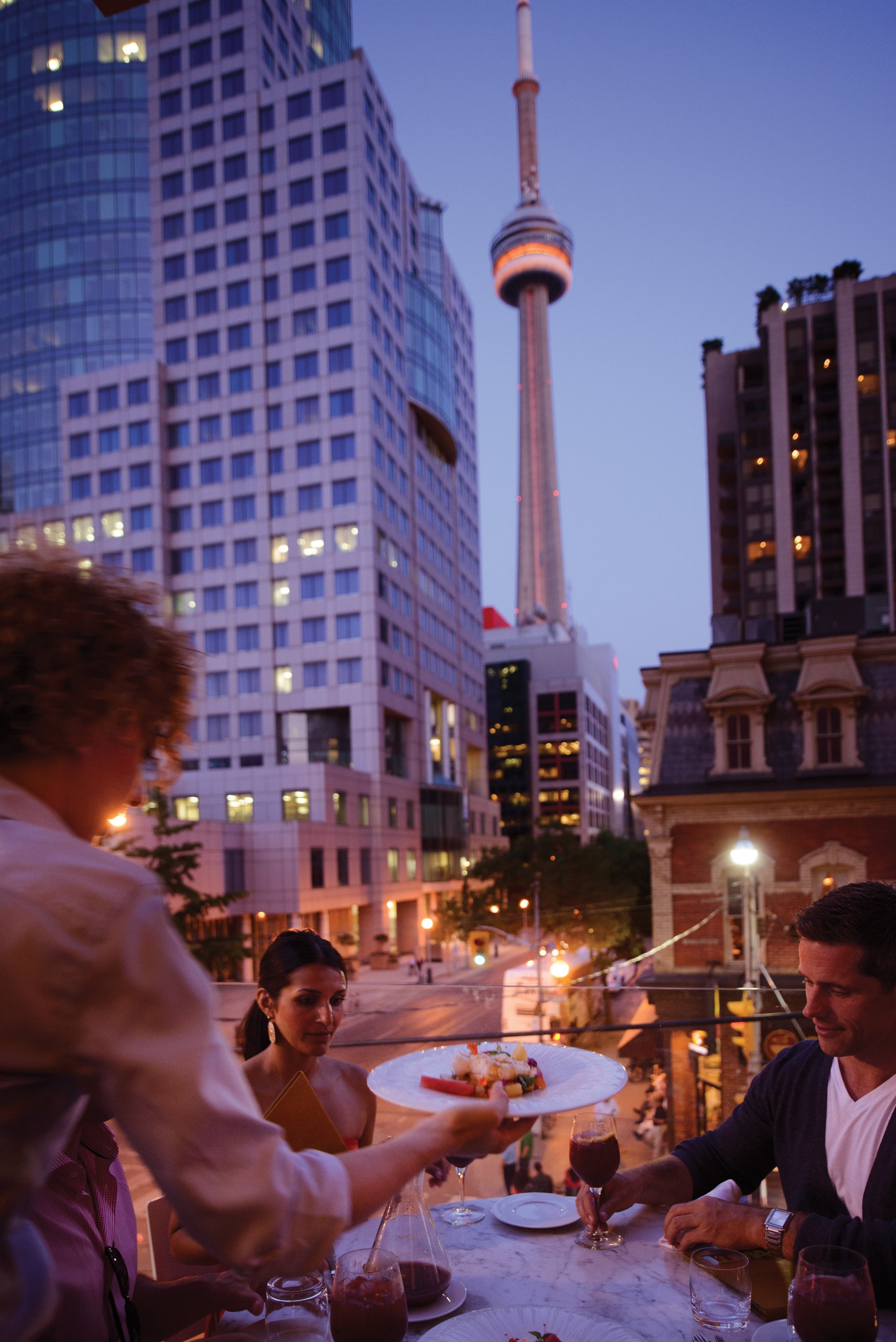 Front Street in Toronto with the CN Tower above