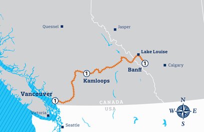 The Rocky Mountaineer travelling beside a river in the mountains