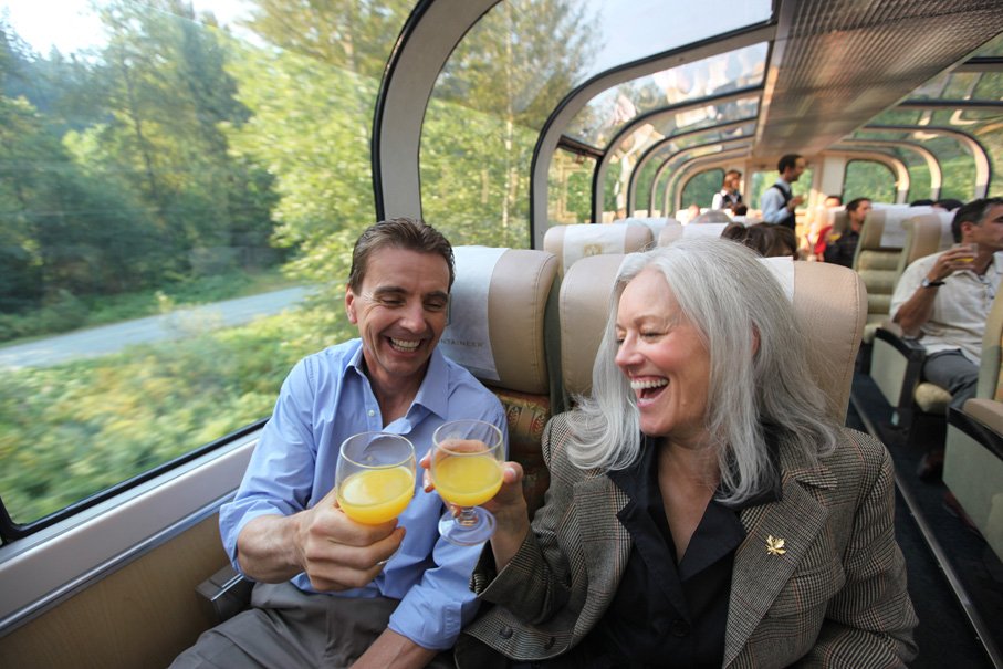 Guests in the Rocky Mountaineer’s glass-domed GoldLeaf coach